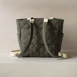Dans le sac â Quilted-Convertible-Backpack-Forest Sac Ă dos matelassĂ© convertible - ForĂȘt - Dans le sac vendu par Veille sur toi
