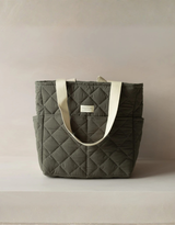 Dans le sac â Quilted-Convertible-Backpack-Forest Sac Ă dos matelassĂ© convertible - ForĂȘt - Dans le sac vendu par Veille sur toi