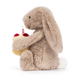 Jellycat BAS3BEBB Peluche - Lapin Bashful beige avec gâteau d'anniversaire - Jellycat vendu par Veille sur toi